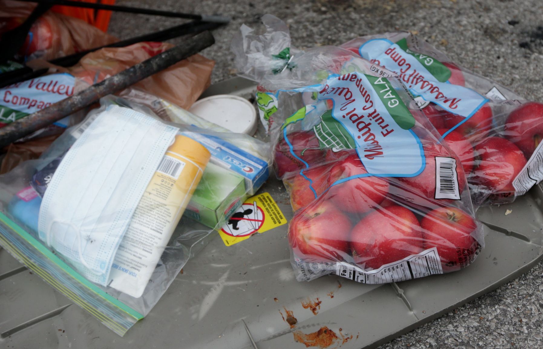 Tent encampment outside vacant McGuire Moving & Storage building